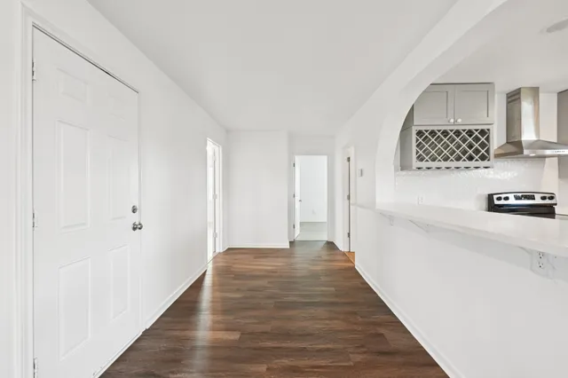 a view of entryway with wooden floor
