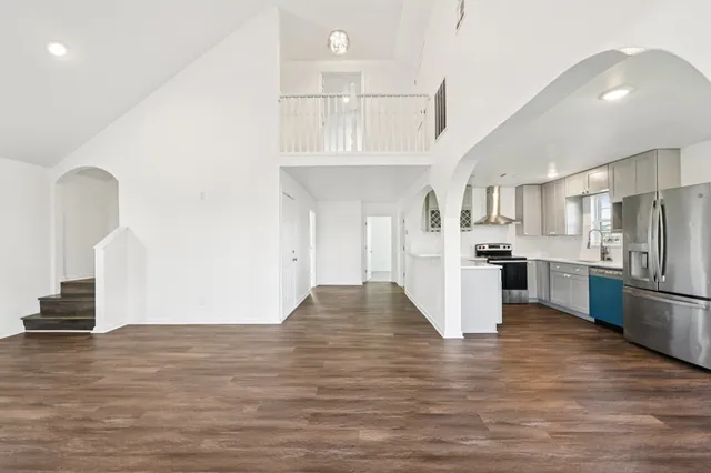 a view of kitchen and wooden floor