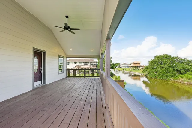 a view of a balcony with lake view and a ocean view
