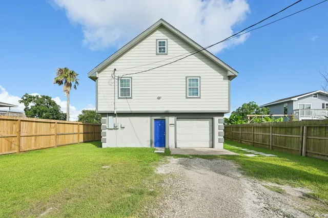 a front view of a house with garage