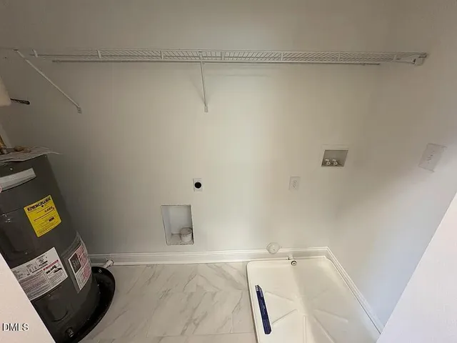 a view of a room with wooden floor and staircase