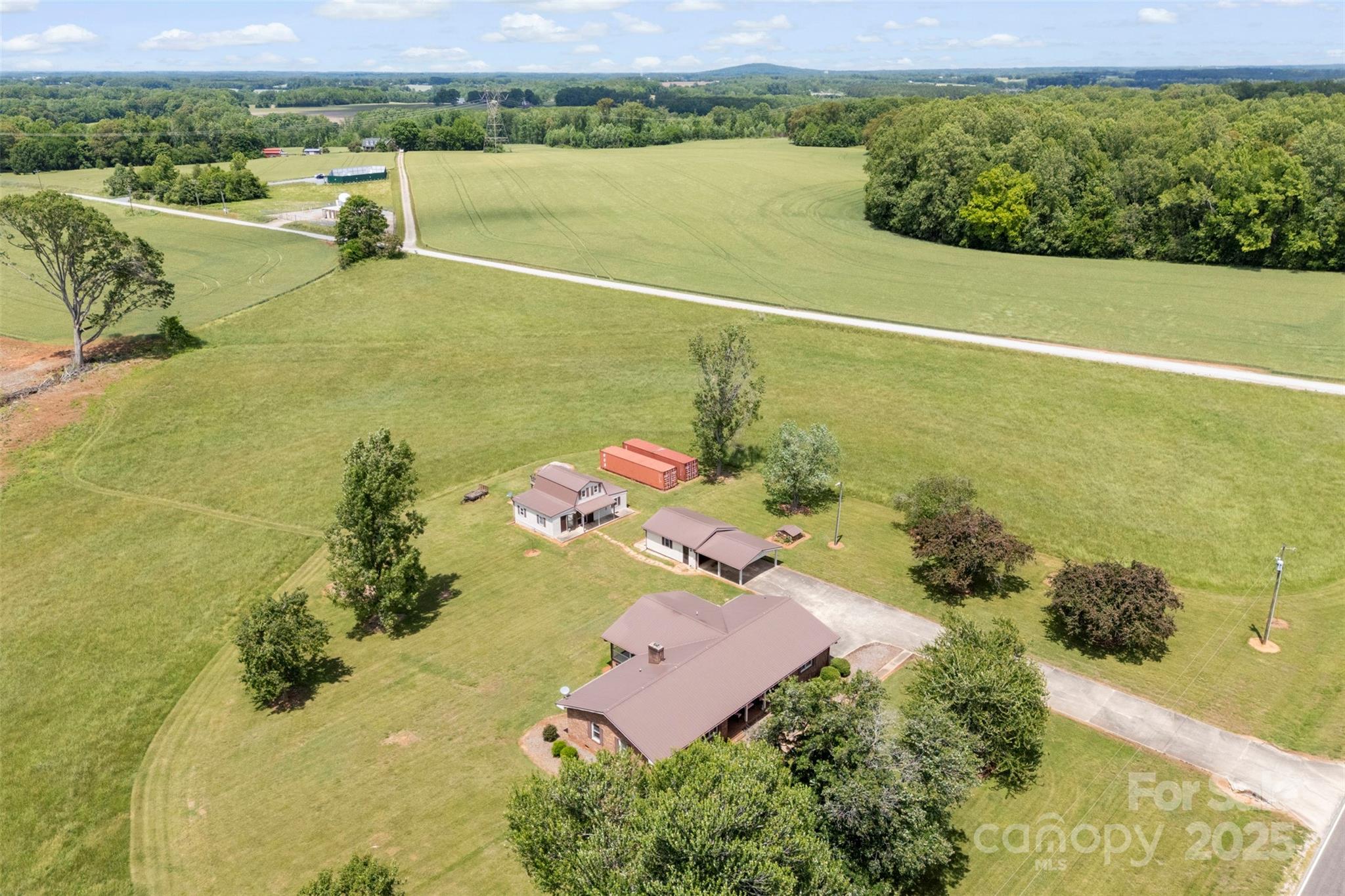 1870 Sloan Road Mount Ulla, NC 28125 - Photo 8 of 44 an aerial view of a house with a lake view