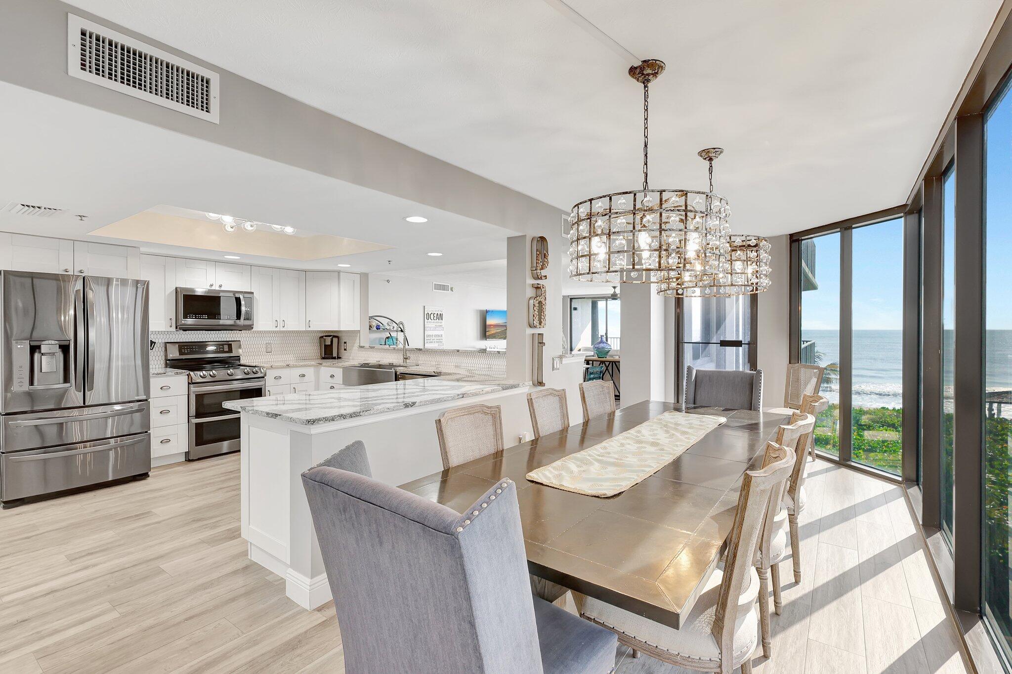 4000 North Hwy A1A, Unit 402 Hutchinson Island, FL 34949 - Photo 13 of 60 a view of a dining room and livingroom view