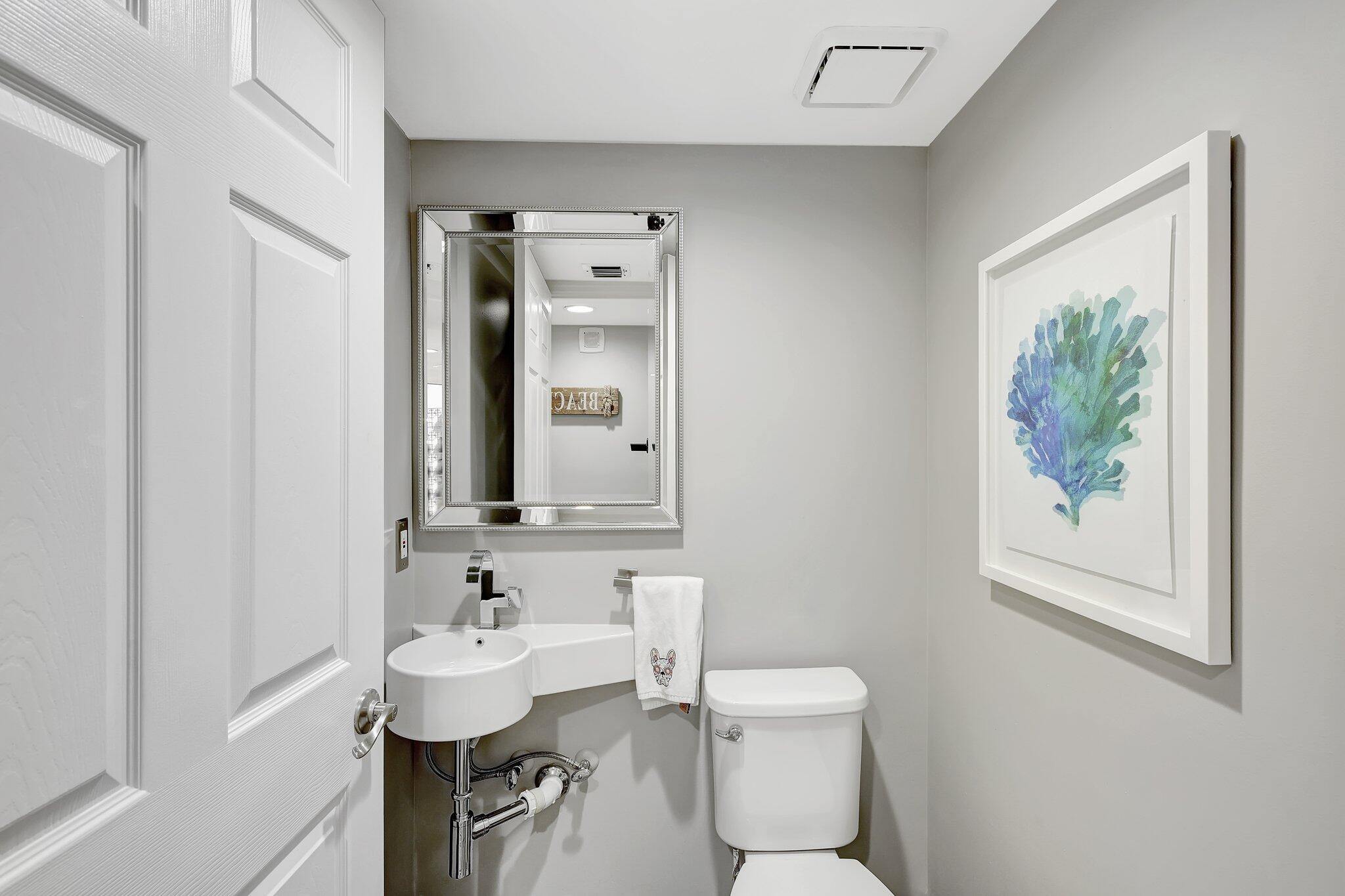 4000 North Hwy A1A, Unit 402 Hutchinson Island, FL 34949 - Photo 21 of 60 a bathroom with a sink and a toilet