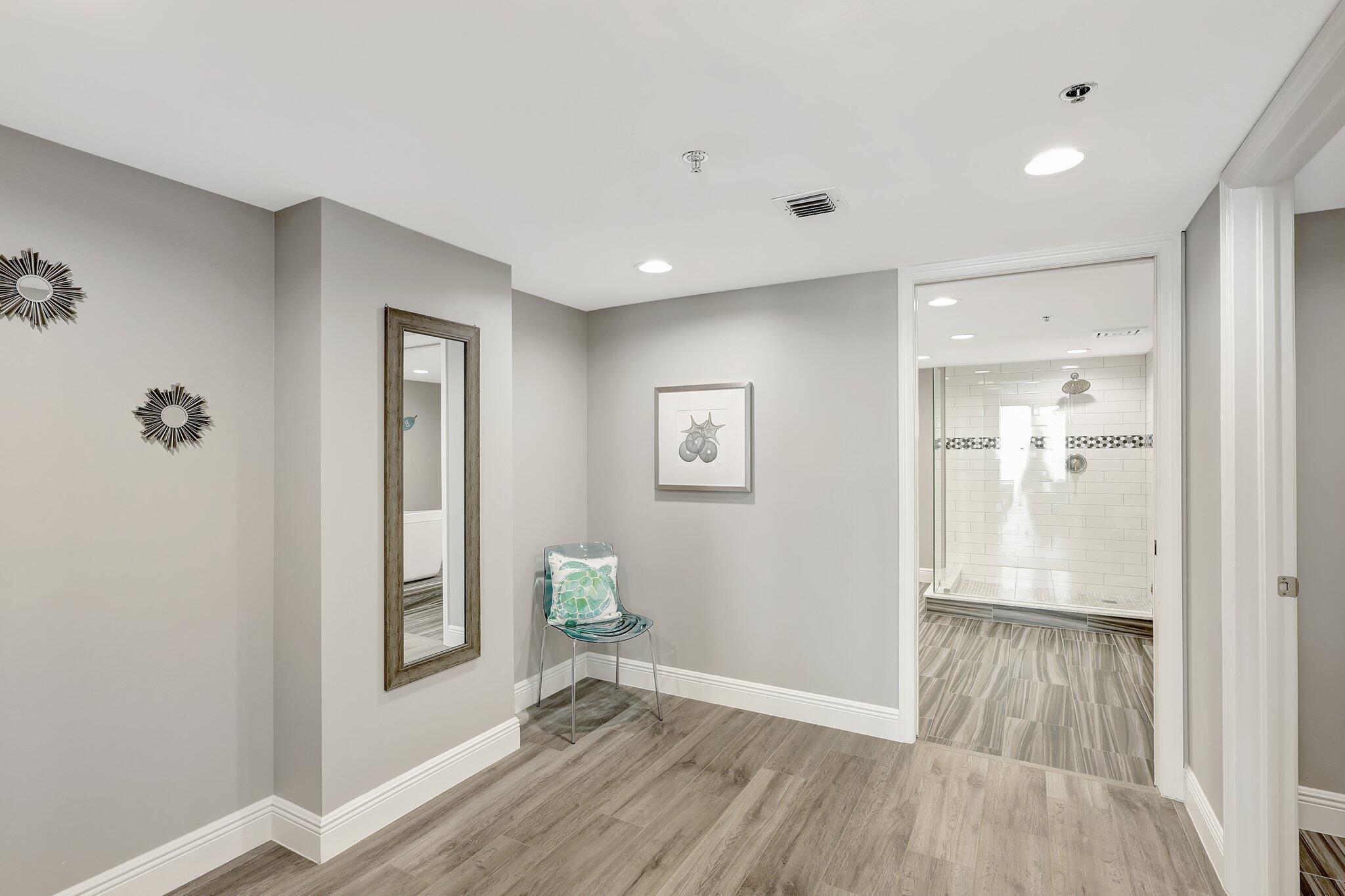 4000 North Hwy A1A, Unit 402 Hutchinson Island, FL 34949 - Photo 28 of 60 wooden floor in an empty room with a window