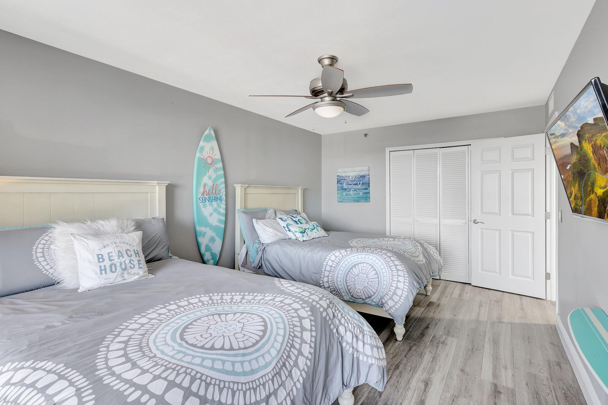 4000 North Hwy A1A, Unit 402 Hutchinson Island, FL 34949 - Photo 39 of 60 a bedroom with two beds and a window