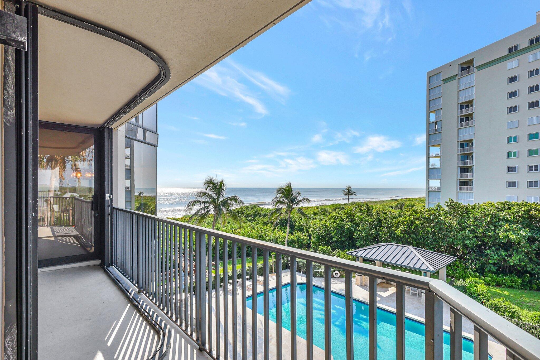4000 North Hwy A1A, Unit 402 Hutchinson Island, FL 34949 - Photo 43 of 60 a view of a balcony with city view