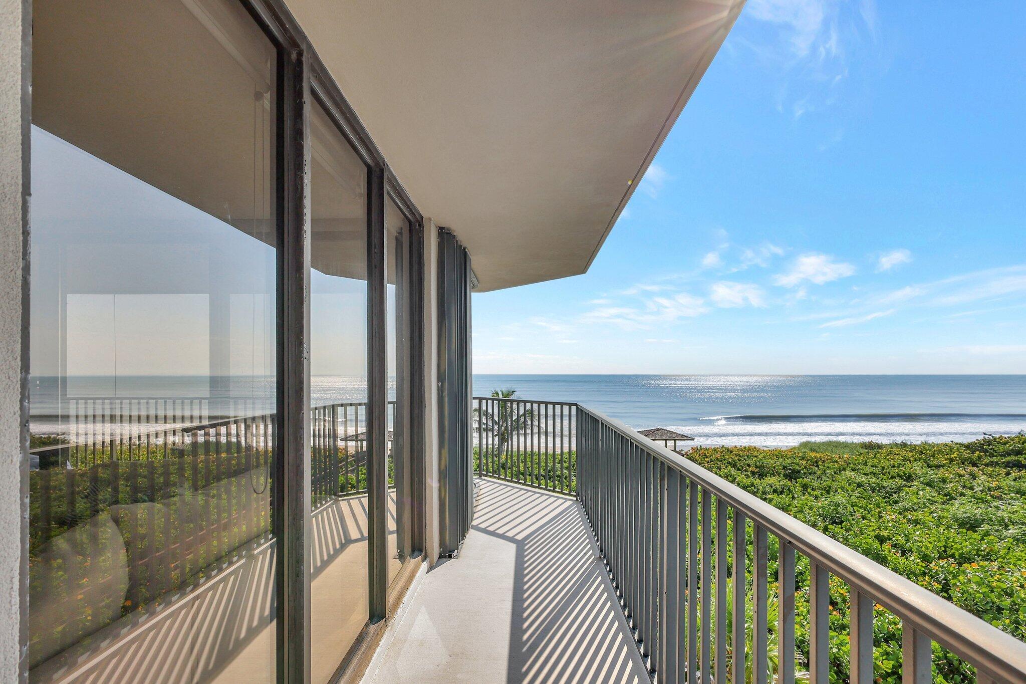4000 North Hwy A1A, Unit 402 Hutchinson Island, FL 34949 - Photo 46 of 60 a view of balcony with floor and wooden floor