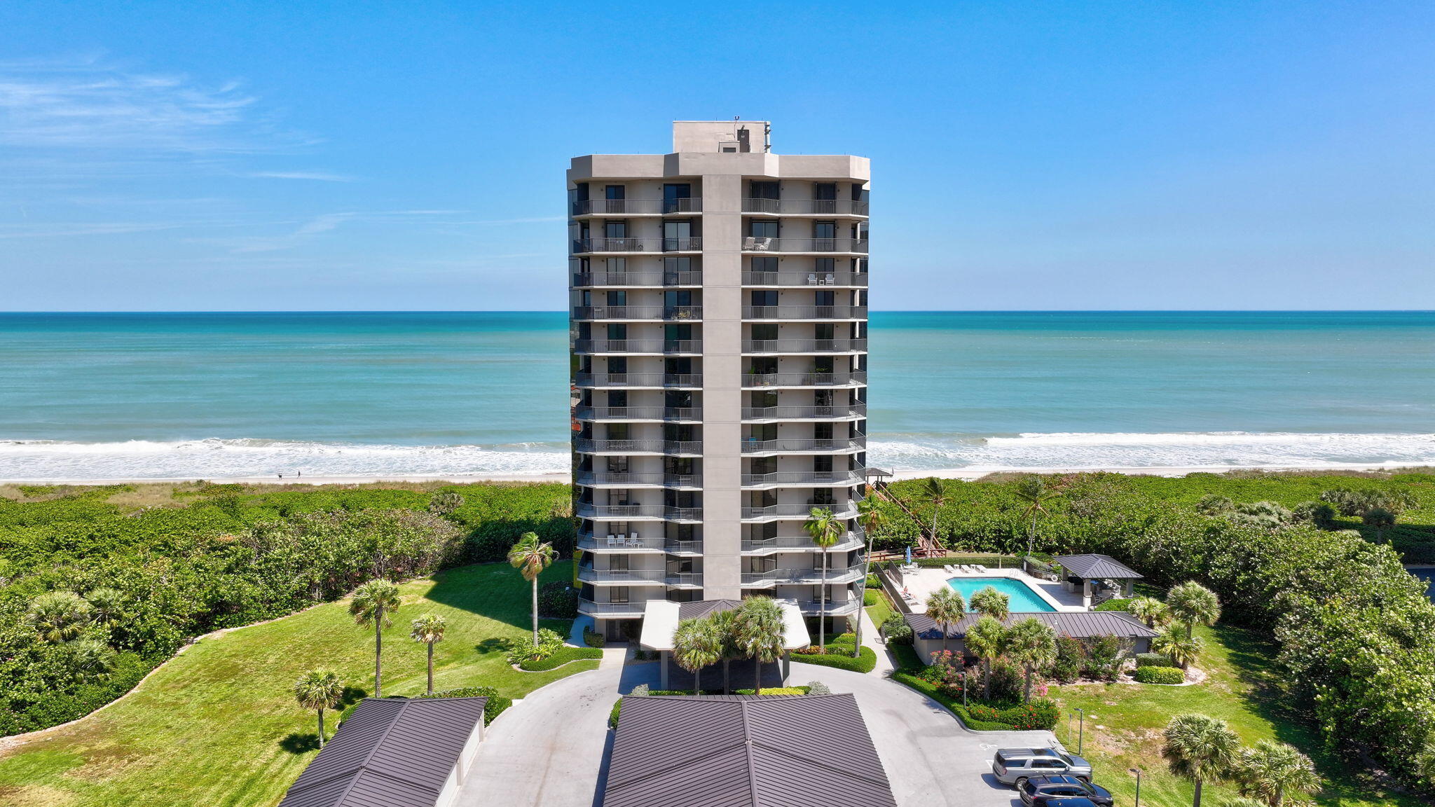 4000 North Hwy A1A, Unit 402 Hutchinson Island, FL 34949 - Photo 58 of 60 a view of a city with tall buildings