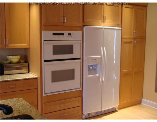 1582 Hampton Road Charleston, WV 25314 - Photo 4 of 8 Kitchen. Darin Fisher designed kitchen with upscale appliances and granite counter tops.