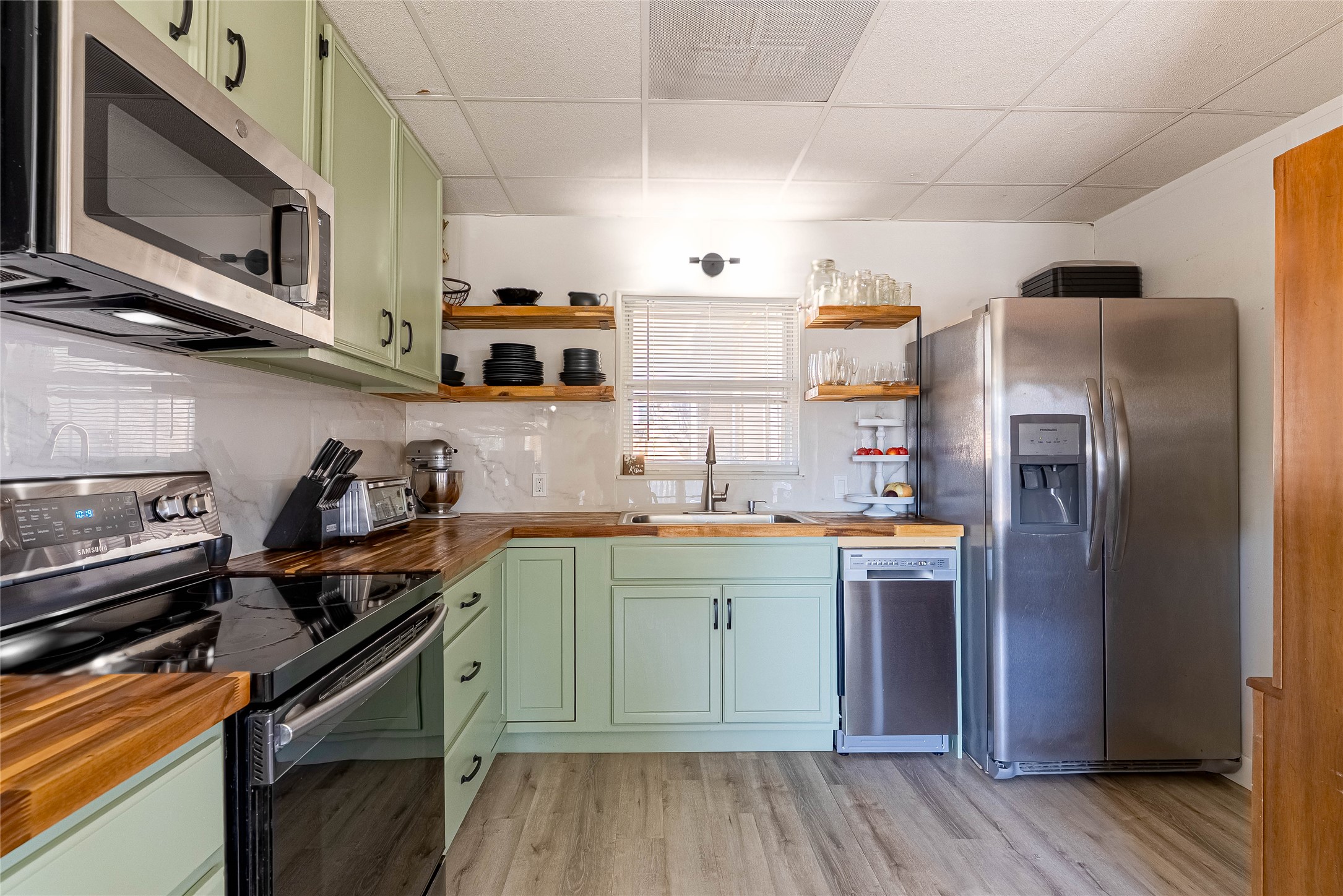 11010 3rd Street Jonestown, TX 78645 - Photo 11 of 23 Inviting kitchen space blending charm and practicality