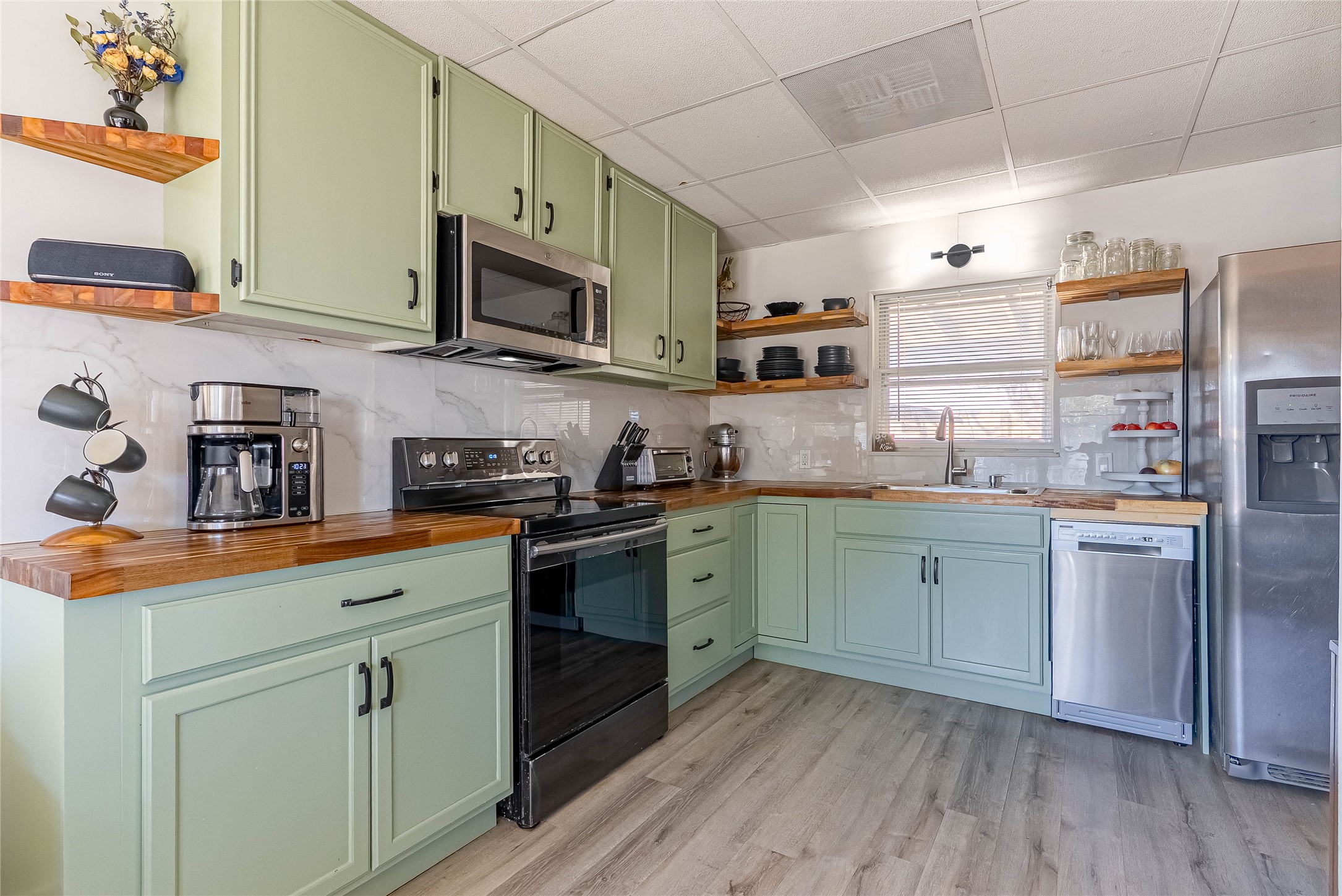 11010 3rd Street Jonestown, TX 78645 - Photo 10 of 23 Bright kitchen with ample counter space and modern finishes