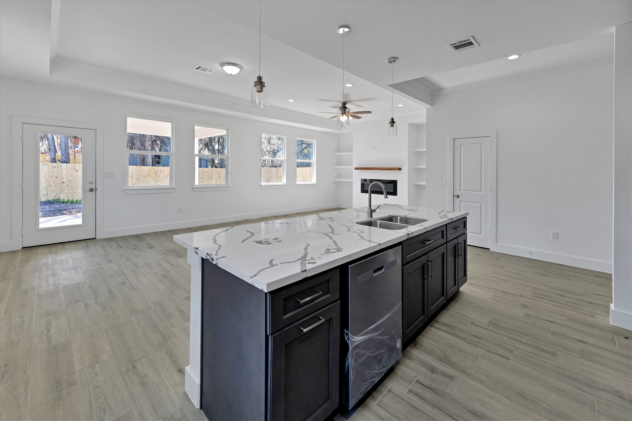 939 Lake View Drive Montgomery, TX 77356 - Photo 12 of 37 a kitchen with a sink stove and cabinets