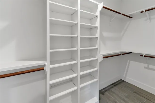 a view of an empty walk in closet