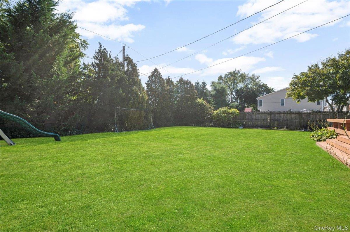 214 Haypath Road Old Bethpage, NY 11804 - Photo 23 of 27 a view of a backyard