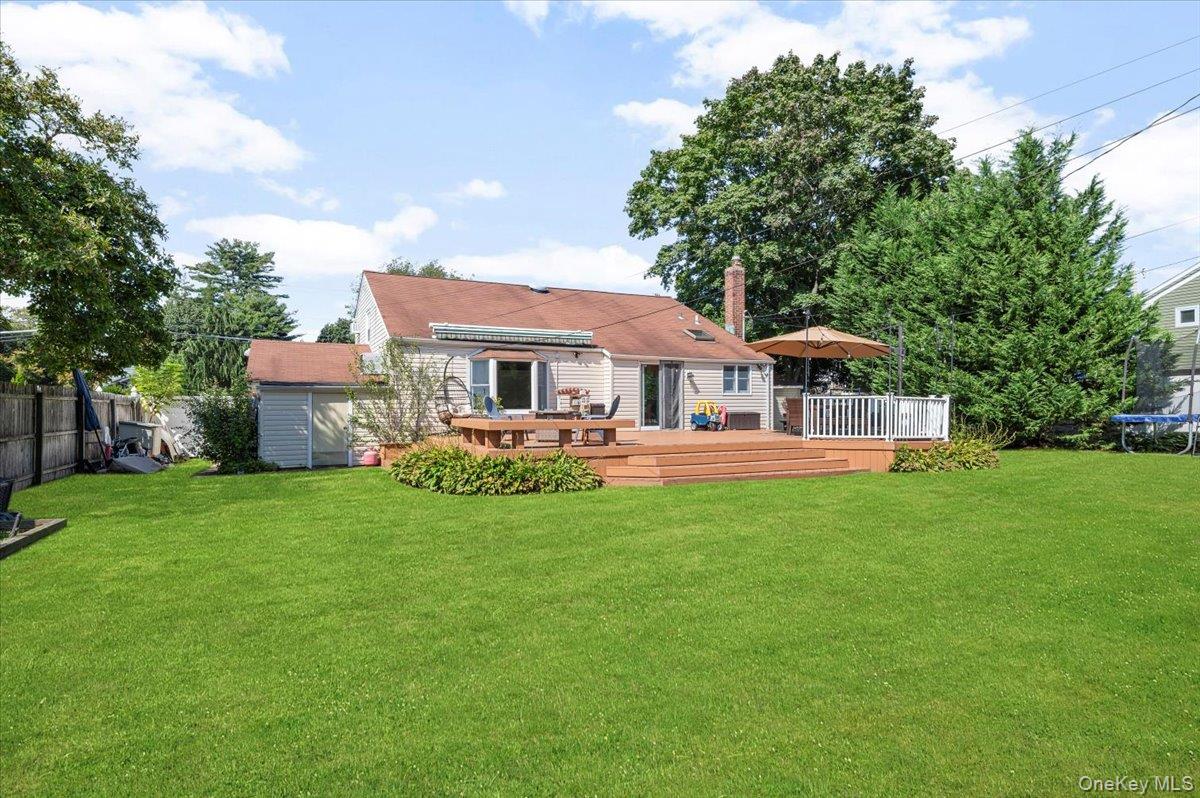 214 Haypath Road Old Bethpage, NY 11804 - Photo 24 of 27 a front view of a house with yard and green space