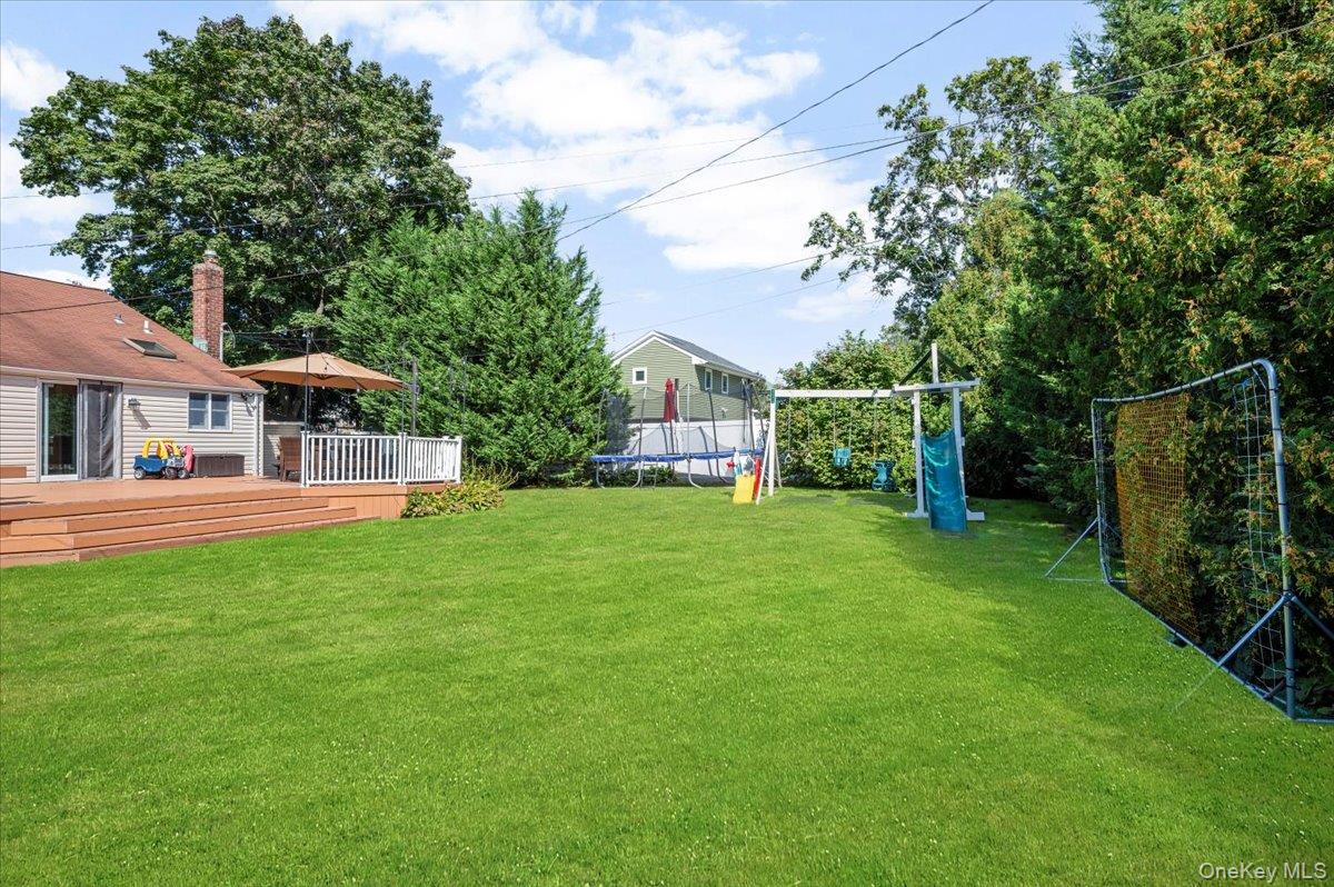 214 Haypath Road Old Bethpage, NY 11804 - Photo 25 of 27 a view of house with a backyard