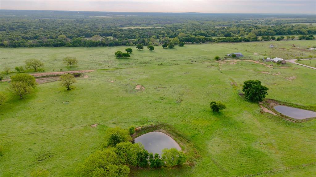 3061 Turkey Creek Road Sunset, TX 76270 - Photo 1 of 38 a view of a lake with a yard