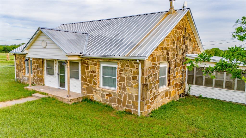 3061 Turkey Creek Road Sunset, TX 76270 - Photo 15 of 38 front view of a house with a yard