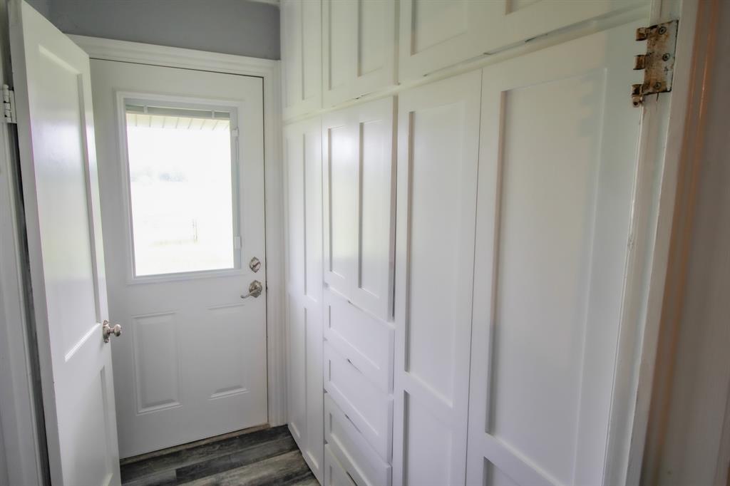 3061 Turkey Creek Road Sunset, TX 76270 - Photo 24 of 38 a view of a bathroom from the hallway