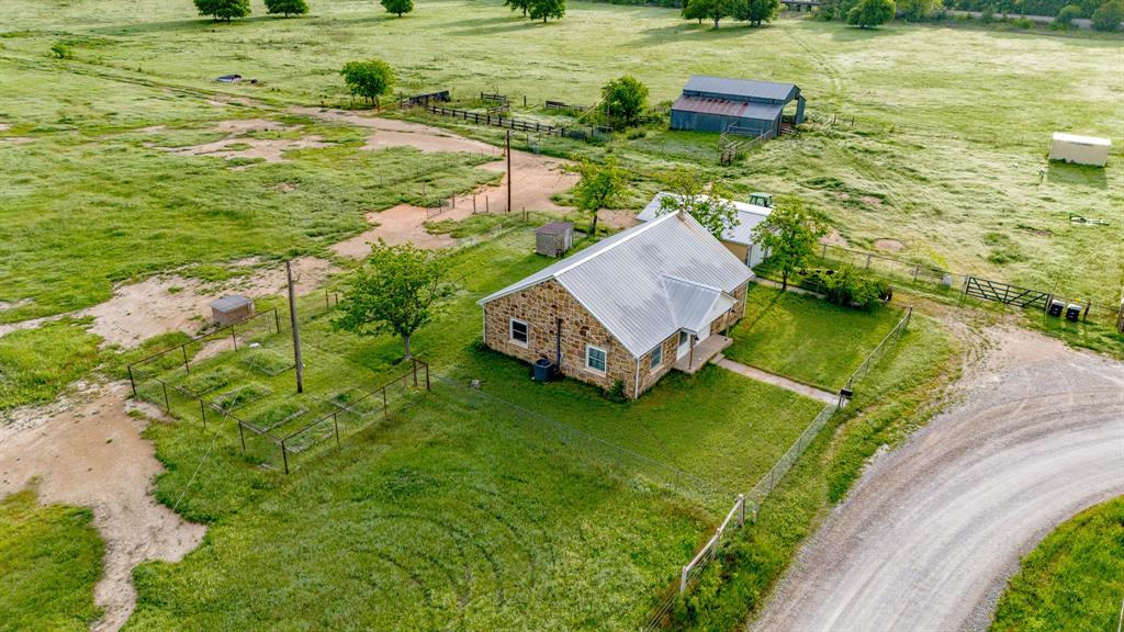 3061 Turkey Creek Road Sunset, TX 76270 - Photo 3 of 38 a view of a garden with an outdoor space