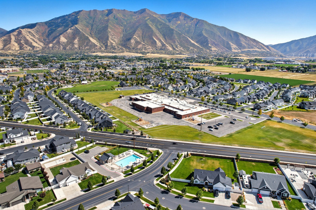 572 South Chamberlain Street Mapleton, UT 84664 - Photo 49 of 56 Aerial overview of community pool, local elementary school and mountain views.
