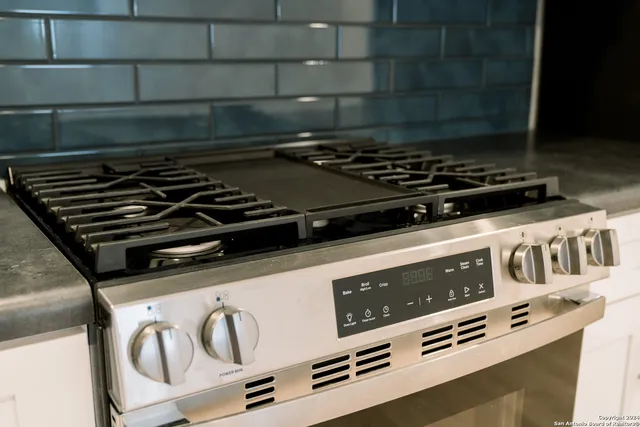 a close view of a stove a microwave and a stove