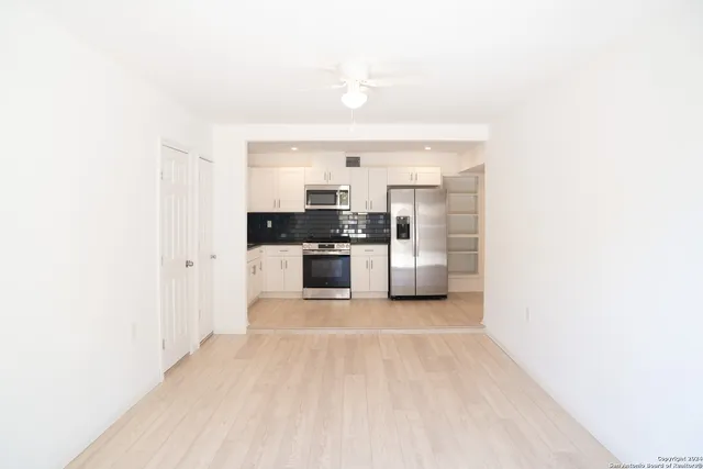 a view of a kitchen with a sink