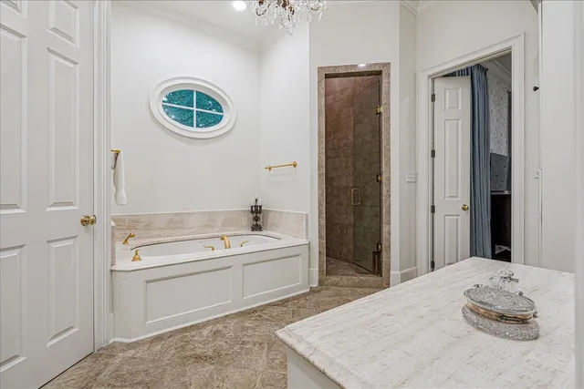 a spacious bathroom with a sink and a mirror