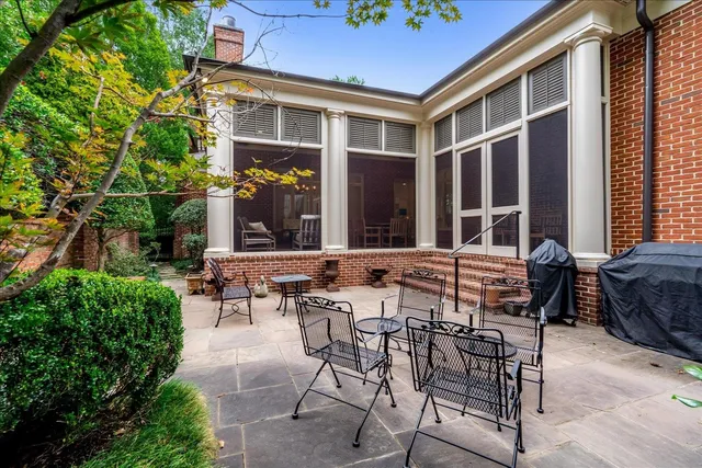 a view of an chairs and tables in the patio