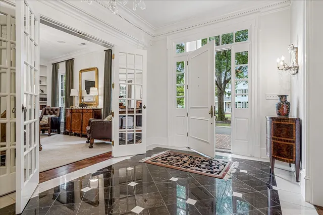 a view of a livingroom with furniture and windows
