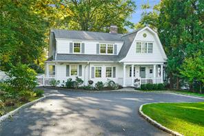 111 Osborn Road Rye, NY 10580 - Photo 1 of 1 a front view of a house with a yard