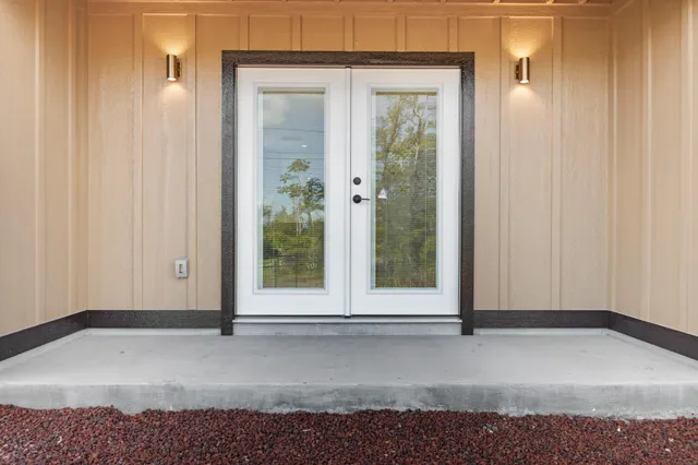 a view of a door in front of a house