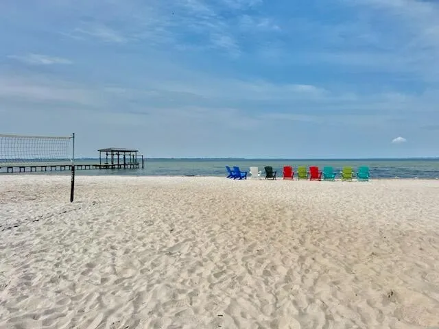 a large room with lots of counter space and windows