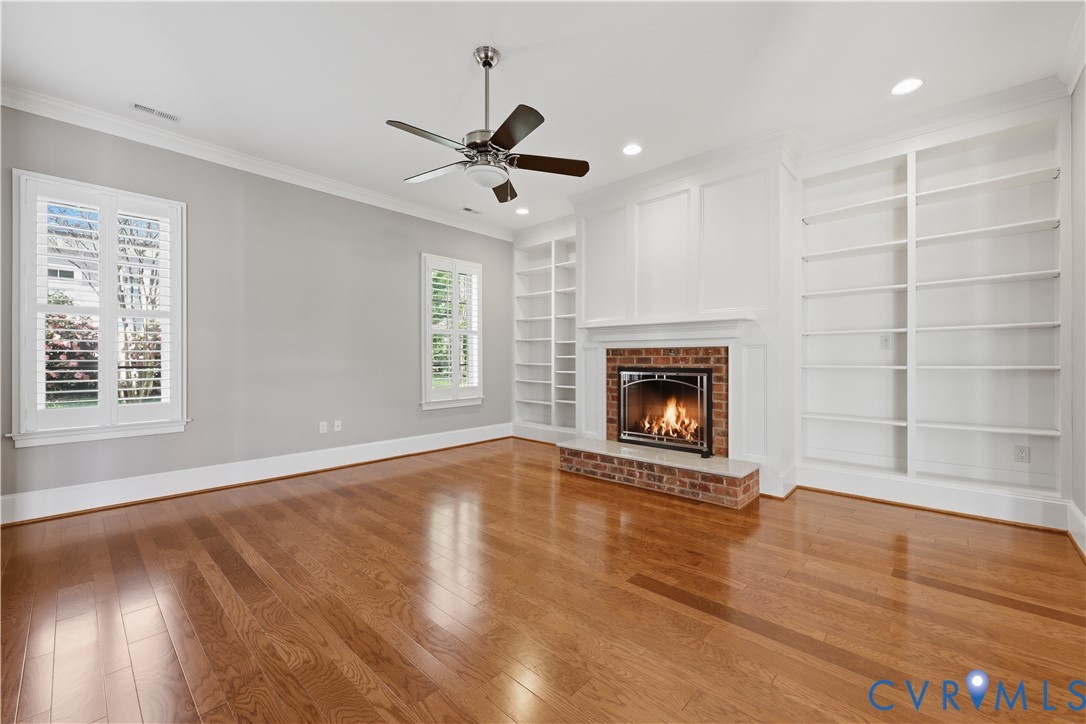 453 Bel Bridge Circle Midlothian, VA 23113 - Photo 25 of 39 Beautiful wood floors and gas logs in the fireplac