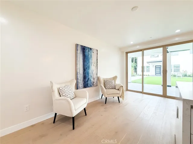 a bathroom with a shower sink and mirror