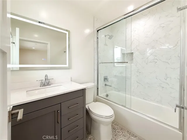 a front view of a house with a yard and porch