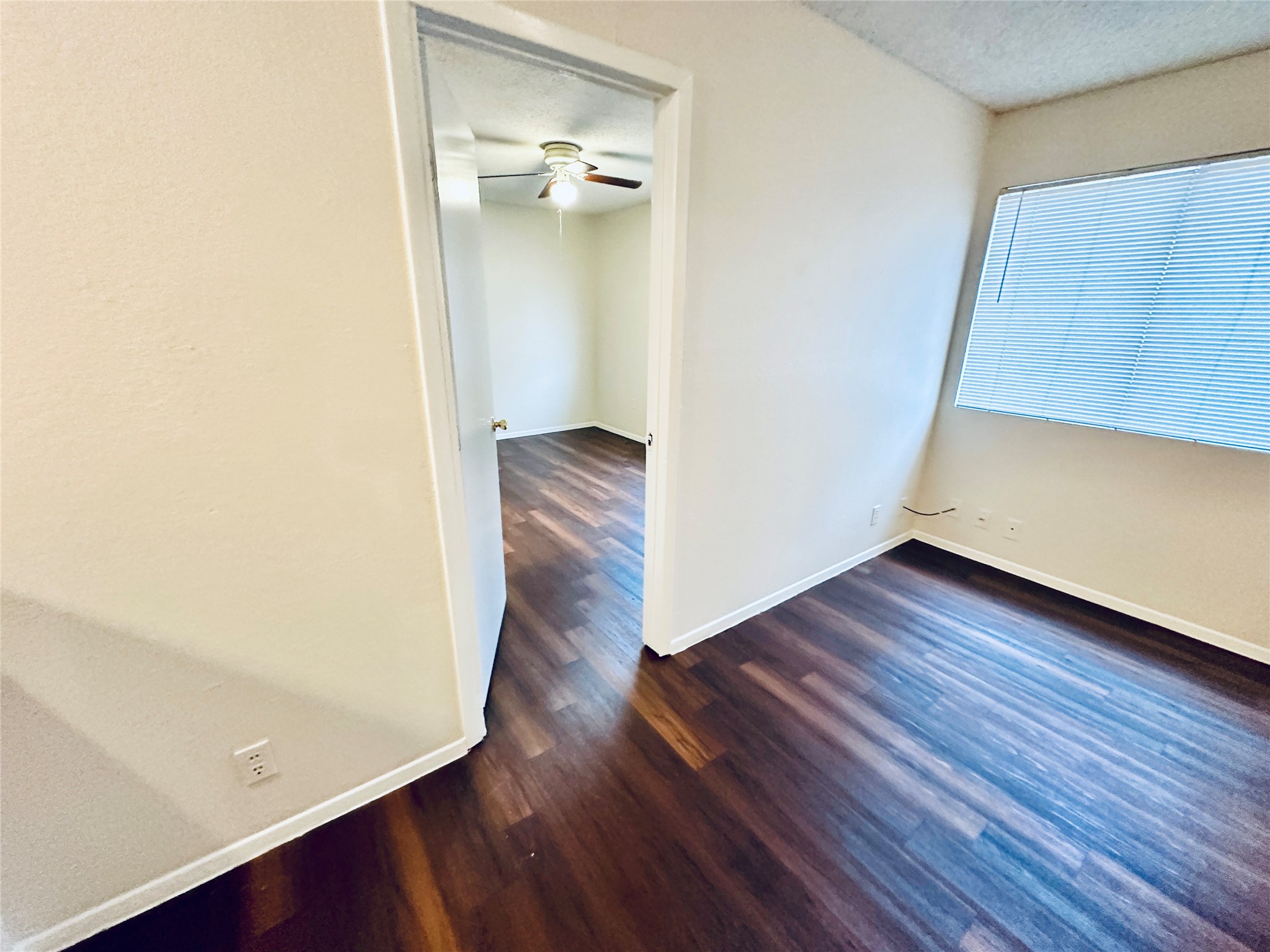 12505 Turtle Rock Road, Unit A Austin, TX 78729 - Photo 14 of 38 Rich hardwood-style flooring creates a warm and inviting atmosphere.
