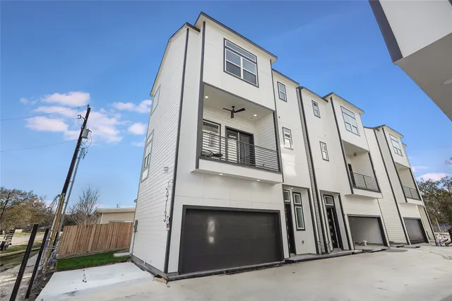 a front view of a house with stairs