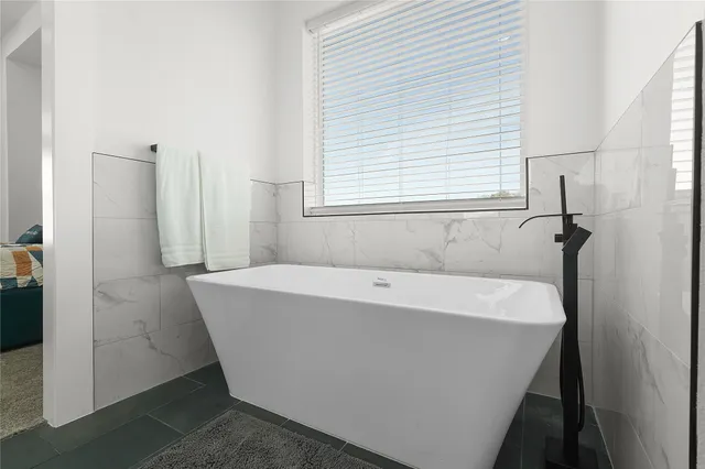 a bathroom with a bathtub