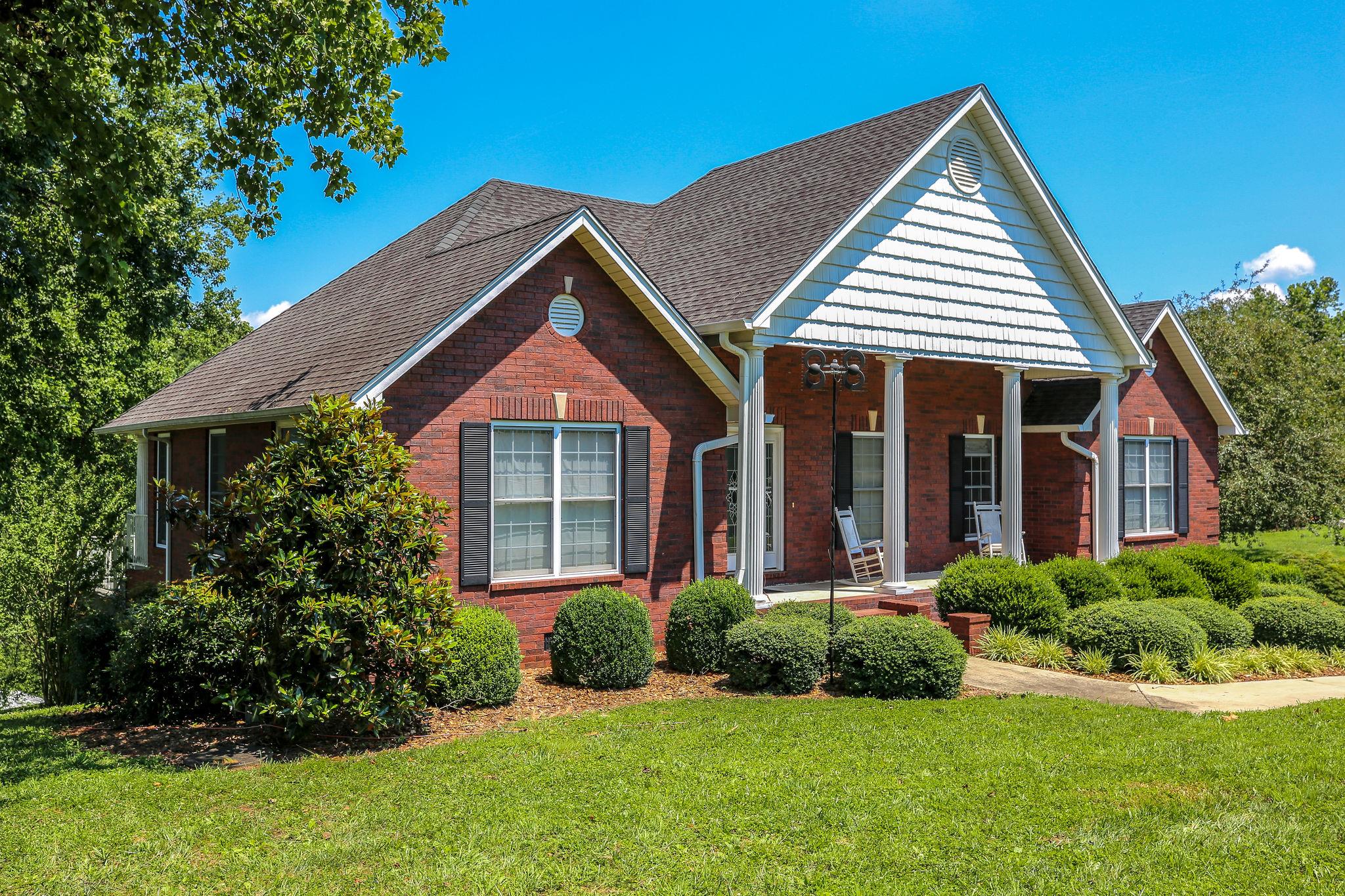 1876 Little Hurricane Road Winchester, TN 37398 - Photo 4 of 30 a view of a house with a yard and potted plants