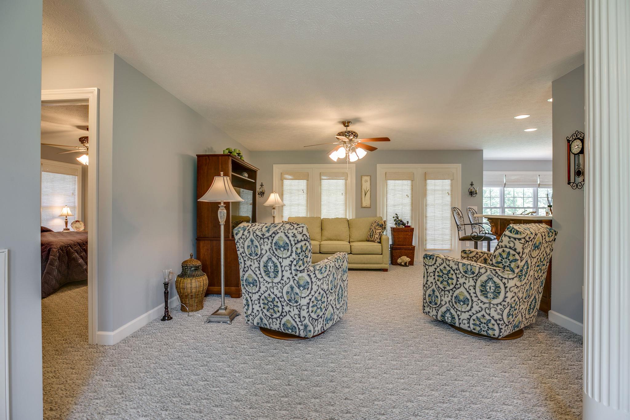 1876 Little Hurricane Road Winchester, TN 37398 - Photo 8 of 30 a living room with furniture and a chandelier