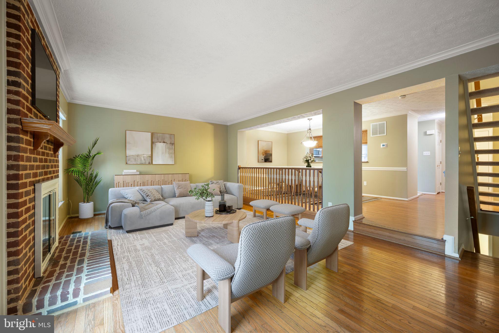 5026 Southern Star Terrace Columbia, MD 21044 - Photo 2 of 47 a living room with furniture and a large window