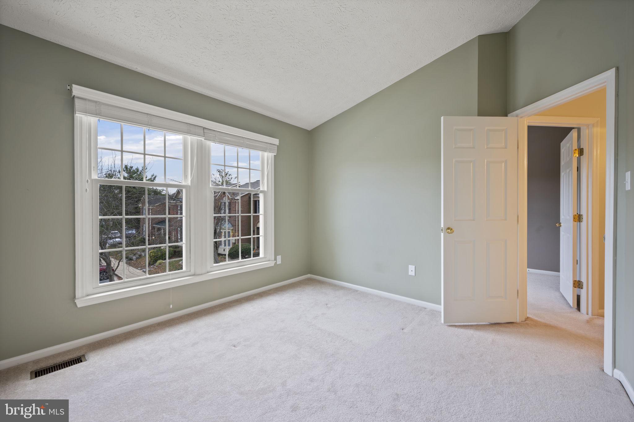 5026 Southern Star Terrace Columbia, MD 21044 - Photo 22 of 47 an empty room with windows and closet