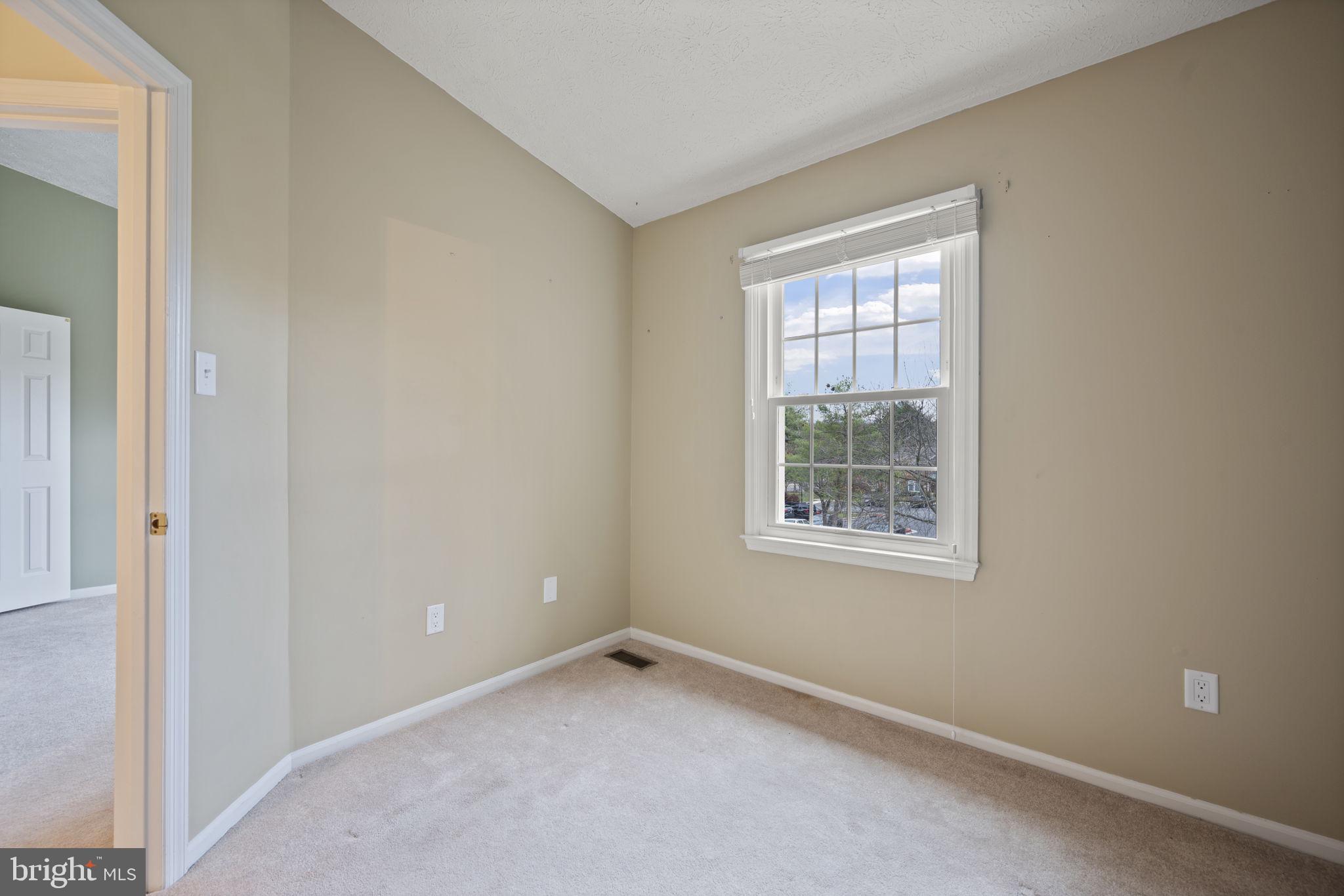 5026 Southern Star Terrace Columbia, MD 21044 - Photo 25 of 47 an empty room with a window