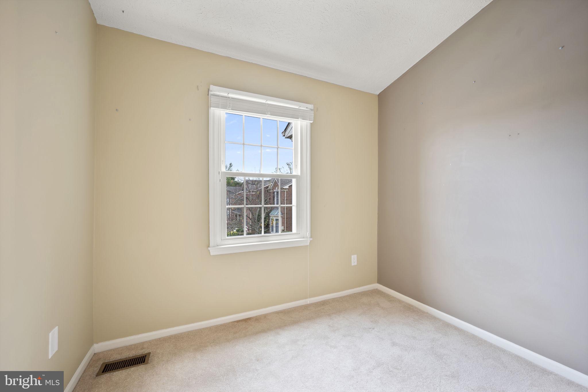 5026 Southern Star Terrace Columbia, MD 21044 - Photo 26 of 47 an empty room with a window
