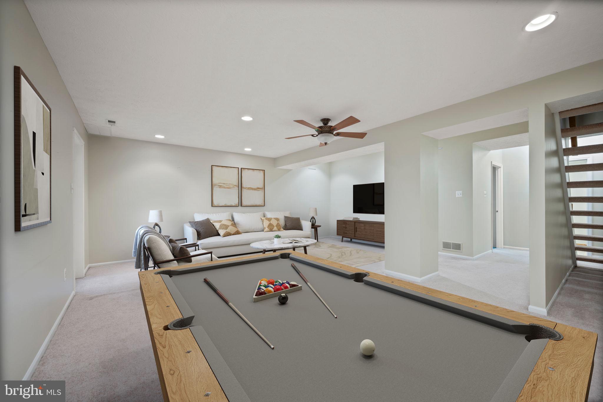 5026 Southern Star Terrace Columbia, MD 21044 - Photo 30 of 47 a living room with furniture and flat screen tv