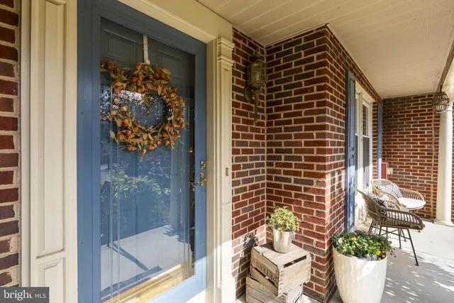 a view of a door with a potted plant