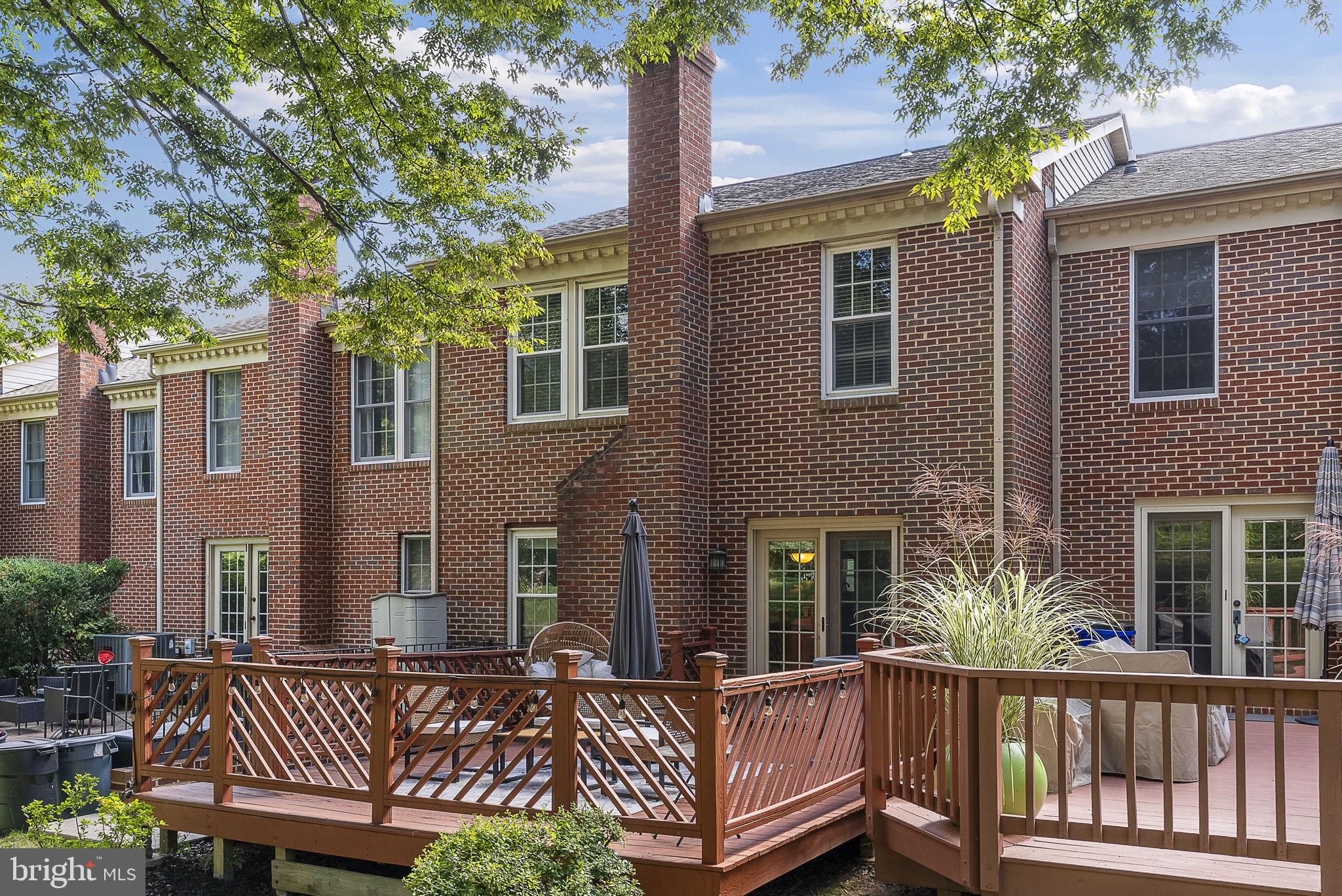 5026 Southern Star Terrace Columbia, MD 21044 - Photo 42 of 47 a view of a house with a wooden fence