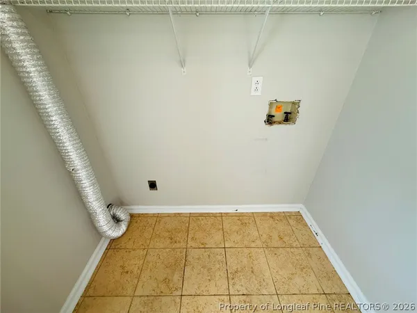 a view of a bathroom with bathtub